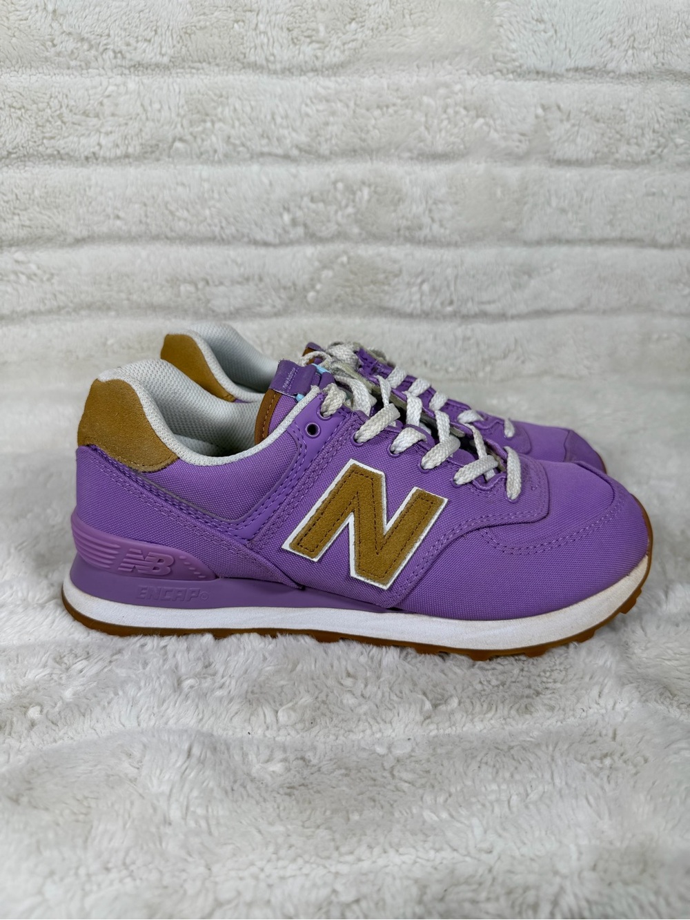 New Balance 574 sneakers womens in a purple and tan color WL574BC2 Size 9